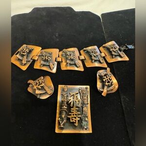 Copper parure. This is a brooch, a bracelet and clip earrings.